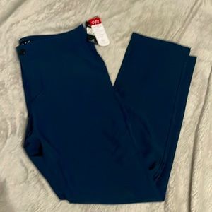 NWT Travis Mathew sz 32 dark blue Laddium pants.